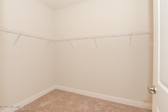 Building Photo - 10976 SW Tessili Wy