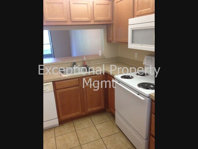 Building Photo - Beautiful Partially furnished annual renta...