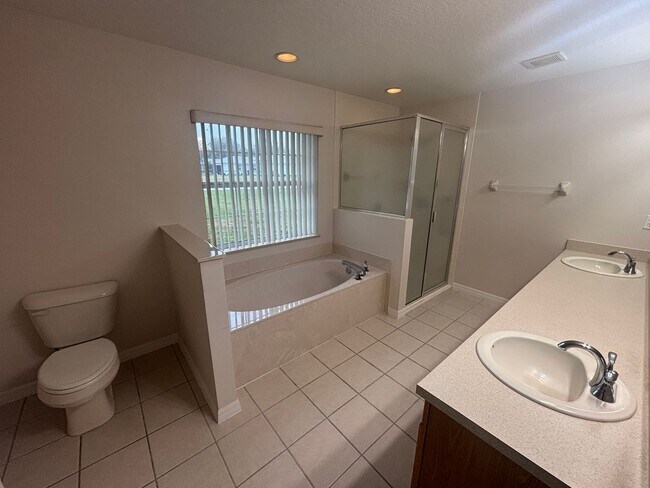 Building Photo - Move in ready 3/2 in 55+ community - near everything