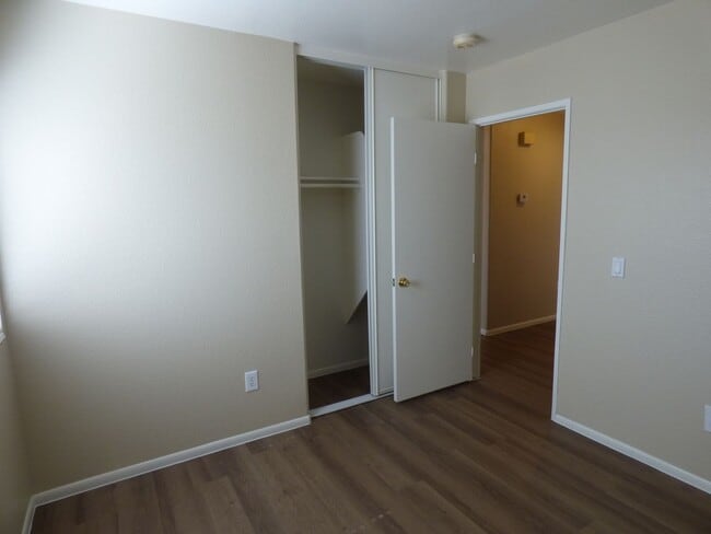 Building Photo - New paint and plank flooring.....convenien...