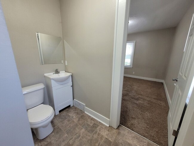 Building Photo - Two bedroom, One Bathroom Home with Partially fenced back yard