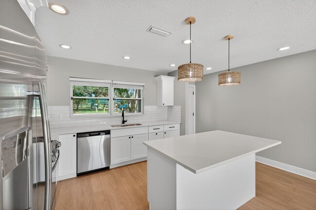 Building Photo - Fully Remodeled 3BR Home with Large Fenced Yard & New Deck