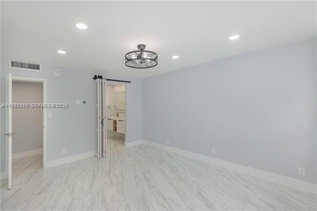 Building Photo - 3180 S Ocean Dr