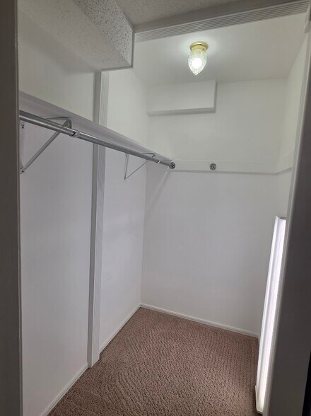 Walk-in closet - 4104 Kim Dr