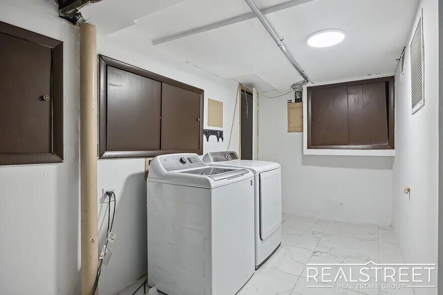 Building Photo - Timelessly Renovated Historic Triplex with...