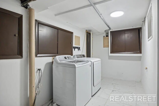 Building Photo - Timelessly Renovated Historic Triplex with...