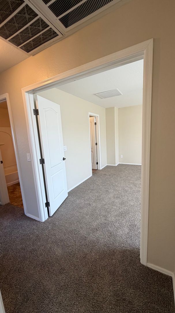 Building Photo - Spacious Surprise home with large backyard