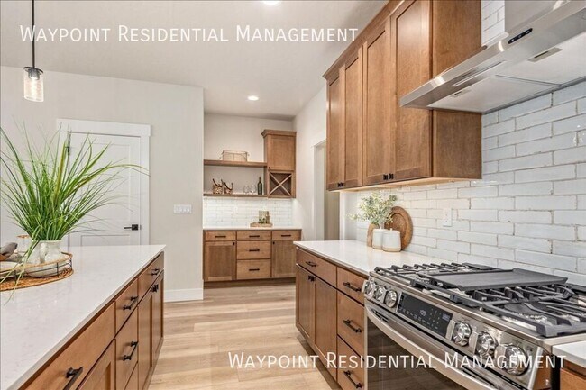 Building Photo - 1704 E Cutgrass Ln