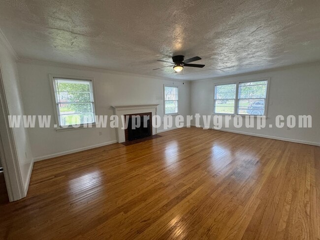 Building Photo - 718 S Donaghey Ave