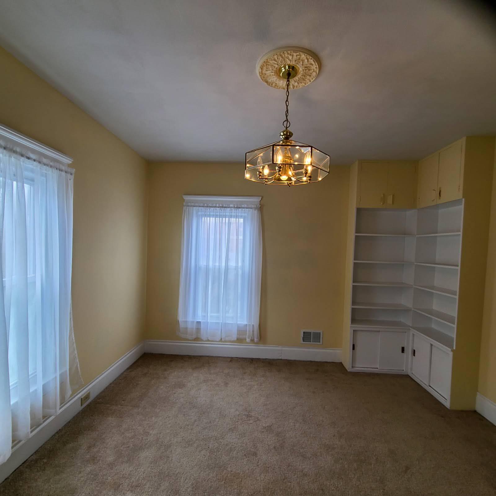 Master bedroom, wall to wall carpet, curtains - 715 N McBride St