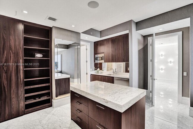 Building Photo - 9705 Collins Ave