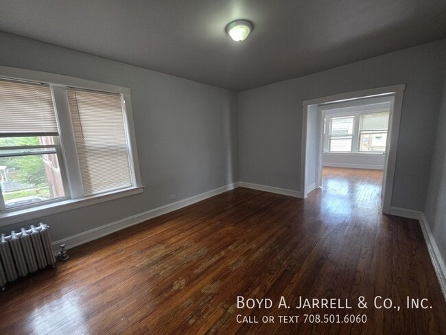 Building Photo - 10853 S Vernon Ave