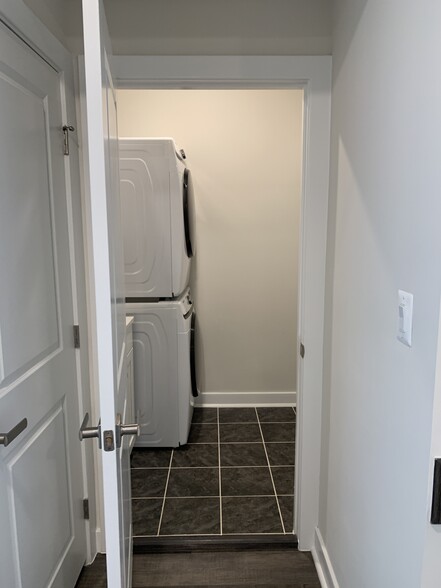 Laundry room - new Samsung washer/dryer - 13274 Woodland Park Rd