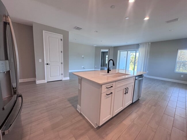 Building Photo - New Construction in Grand Park-4 Bedrooms and 4 Bathrooms with a Den and a Loft! No deposit for q...