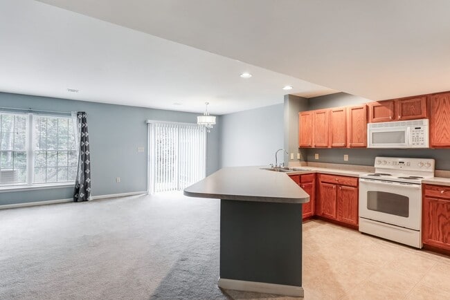 Building Photo - Three bedroom two and a half bathroom town...