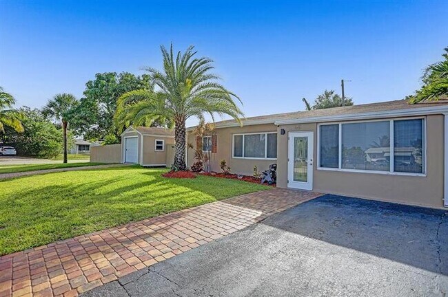 Building Photo - 651 NE 59th Ct