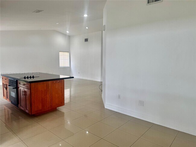 Building Photo - 14570 SW 145th Pl