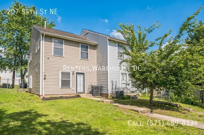 Building Photo - 207 54th St NE