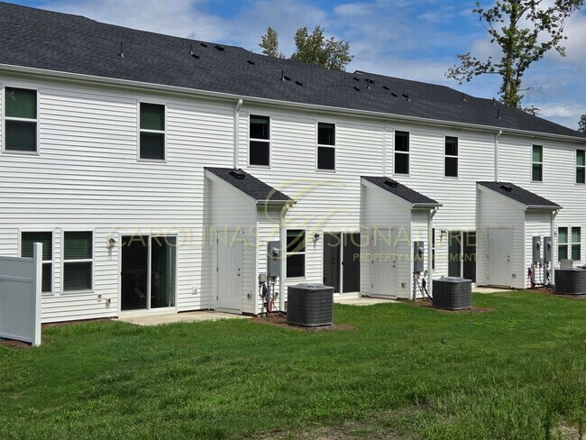 Building Photo - AVAILABLE SEPTEMBER 1! NEW CONSTRUCTION; 3...