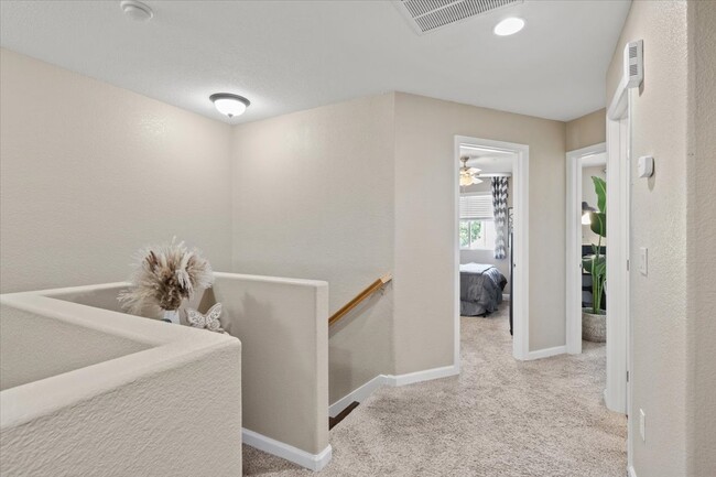 Hallway facing Bedrooms 2 & 3 - 807 Esplanade Cir