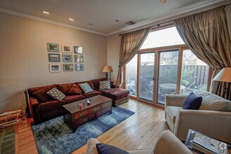 Building Photo - 3-bed, 2-bath GIANT townhouse + GARAGE, BA...