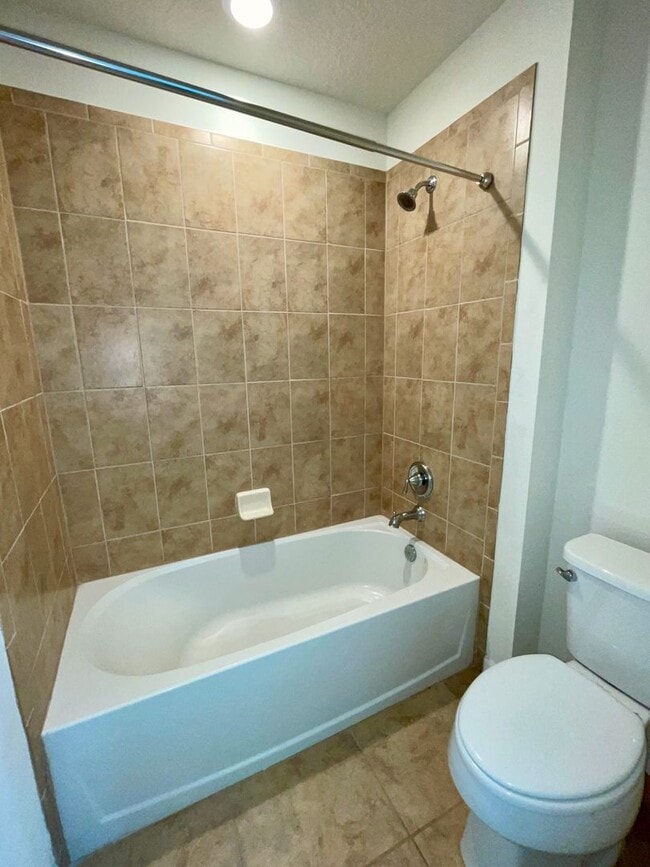 Building Photo - Spacious 5-Bed / 4.5-Bath Townhome w/ Private Pool & Sundeck in Gated Oakmont at Solterra Near Di...