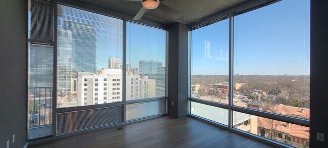 Building Photo - Modern Corner Unit 1BR Condo in Midtown with Skyline Views