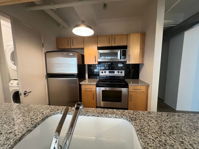 Building Photo - Amazing condo in historic Bennie Dillon Building