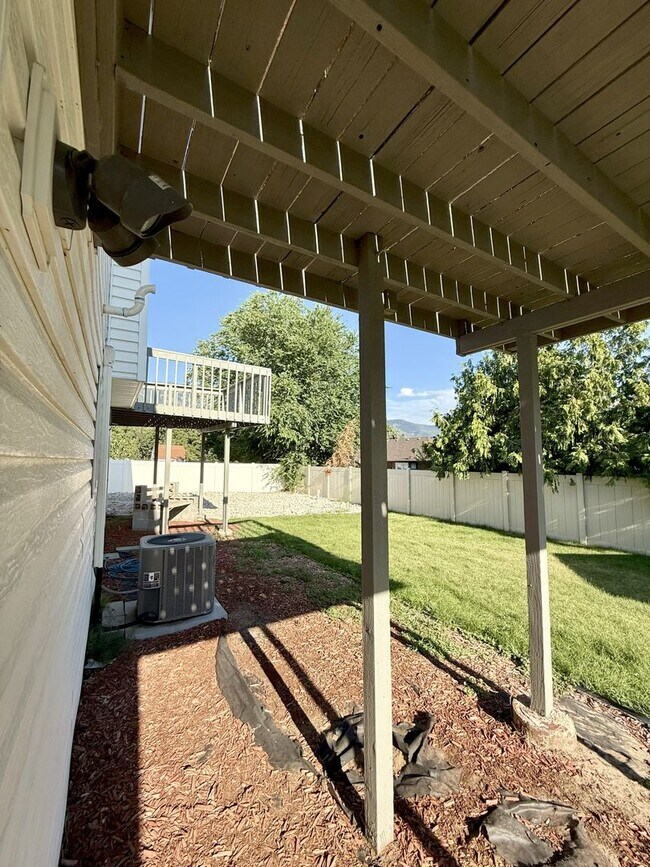 Building Photo - Spacious Comfort Meets Practical Living in...