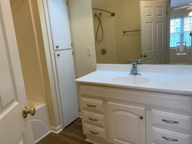 Building Photo - SPACIOUS HOME WITH DOWNSTAIRS PRIMARY BEDROOM AND BATH- LAKE WHEELER/ FARMER'S MARKET AREA