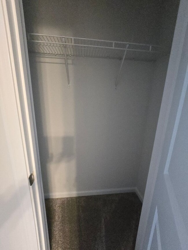 Building Photo - NEWLY BUILT END UNIT TOWNHOME