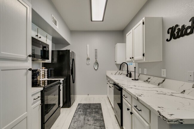 Building Photo - Stylish Fully Furnished 1BR Condo with Private Patio & Custom Closet