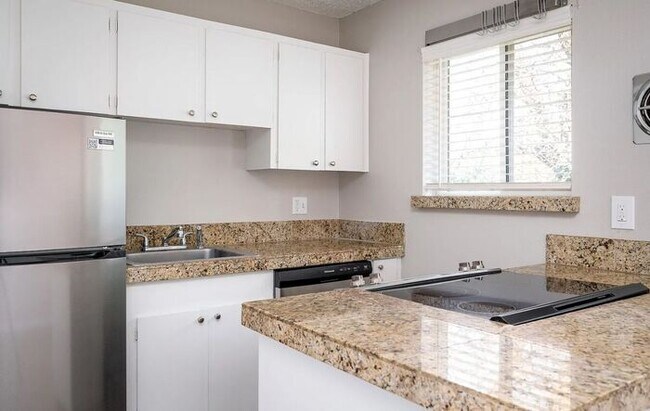 Building Photo - Modern Living Meets Timeless Comfort! 2 be...