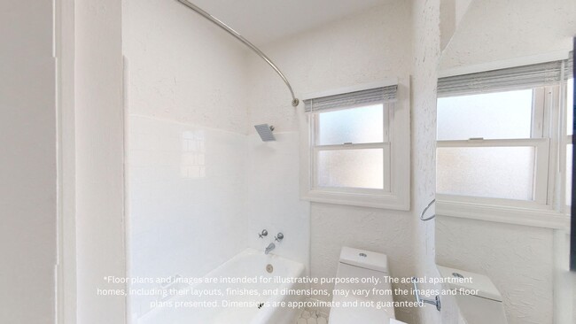 Bathroom with a toilet and bathtub - 2410 Dwight Way