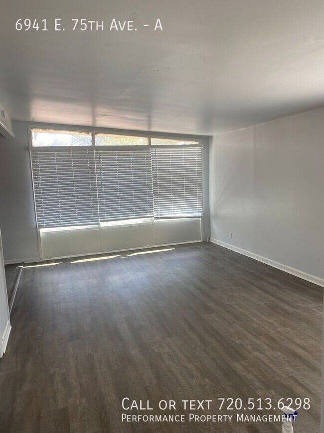 Building Photo - 6941 E 75th Ave