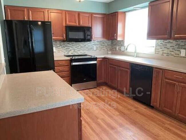 Building Photo - 10821 Curtis Ave Cir