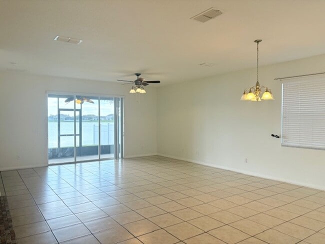 Building Photo - Water View 4/3 in Wyndham Lakes Estates ne...