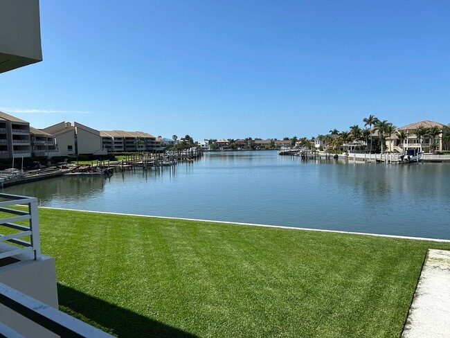 Building Photo - Beautifully Remodeled 2/2 Waterfront Unit ...