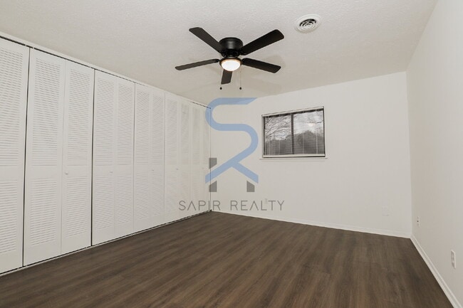 Building Photo - Move in before December 31st and choose your reward: a $250 Amazon Gift Card or a 55" Smart TV!