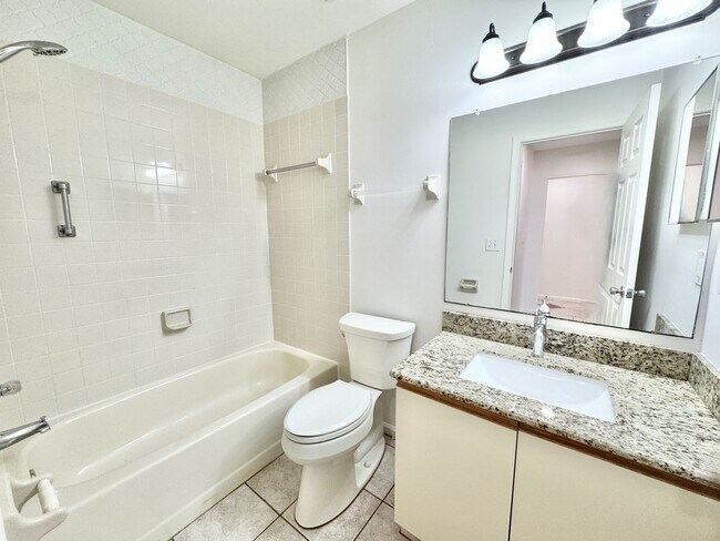 Building Photo - ** ROYAL WOOD ** 2 + DEN / 2 BATH - CONDO ...
