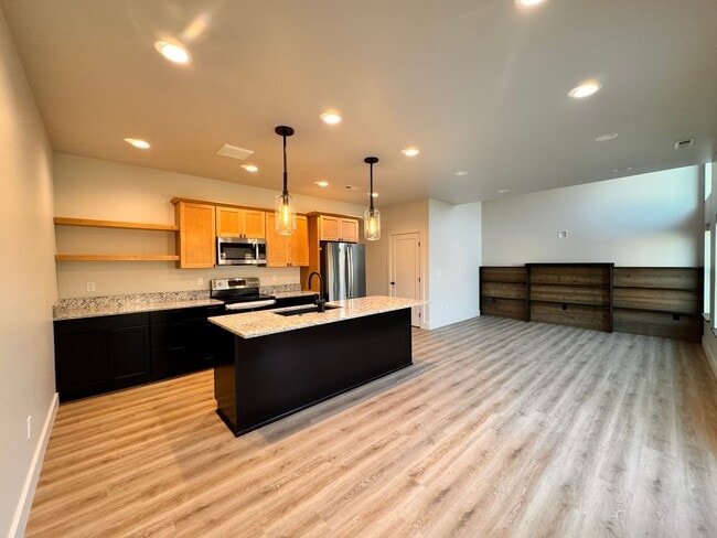 Building Photo - Modern, Spacious 3-Bedroom Townhome in the...
