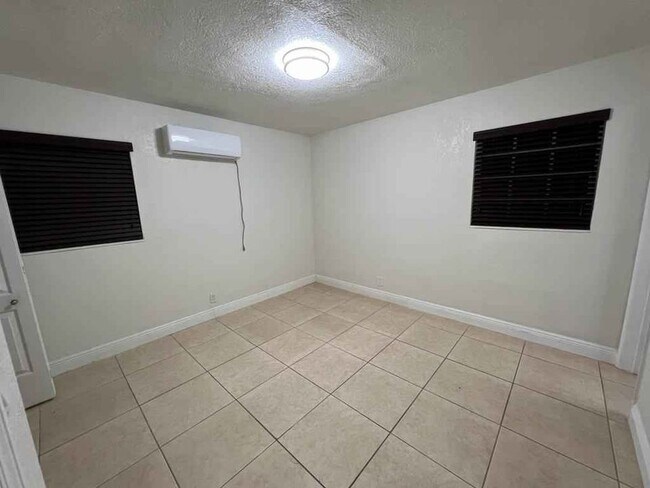 Building Photo - 6870 SW 5th Ct