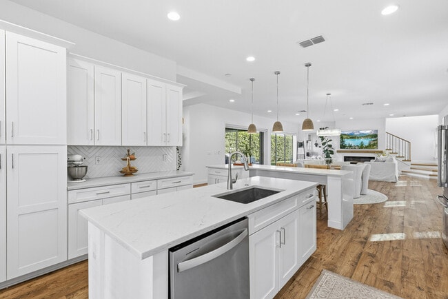 Building Photo - Luxury 5-Bedroom Residence in Eagle Creek with Indoor-Outdoor Living