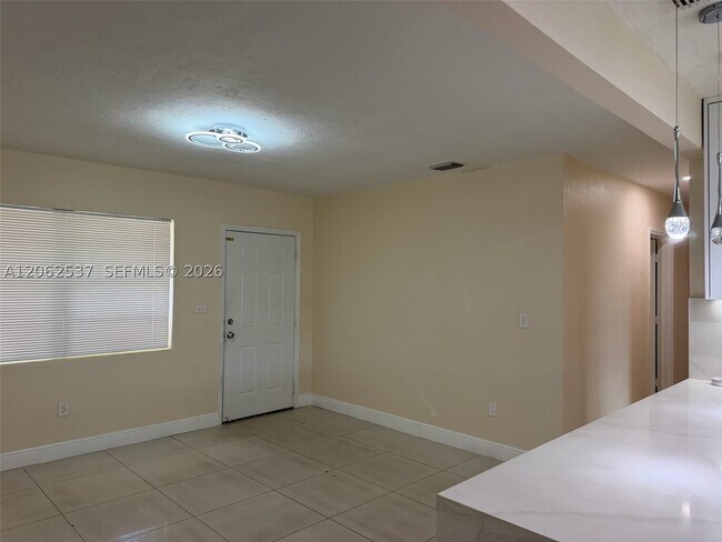 Building Photo - 9016 NW 35th Ct