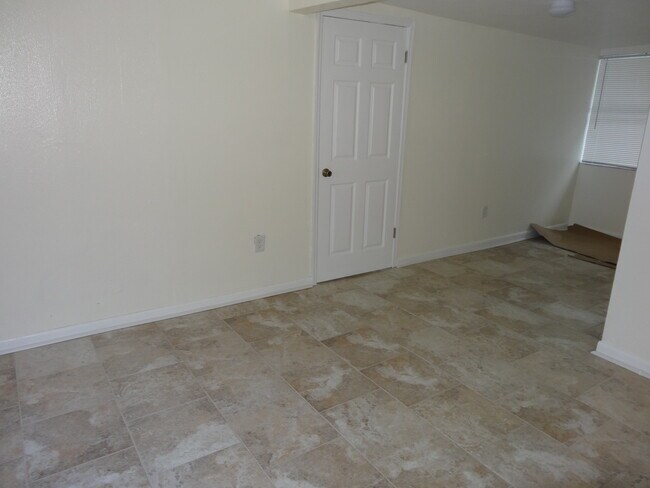 Building Photo - Stunning Corner-Lot Rental: 4BR/2BA with Courtyard