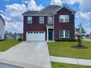 Building Photo - Stunning 4BR Home with Fenced Yard, Loft & Luxury Finishes in highly desirable Woodcreek Farms ne...