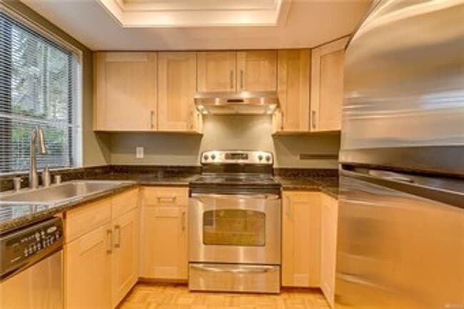 Building Photo - Freshly Updated 3BR Condo w/ Cozy Fireplace, Deck & 2 Parking