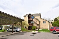 Building Photo - Pet Friendly! Top Floor Apartment! Conveni...