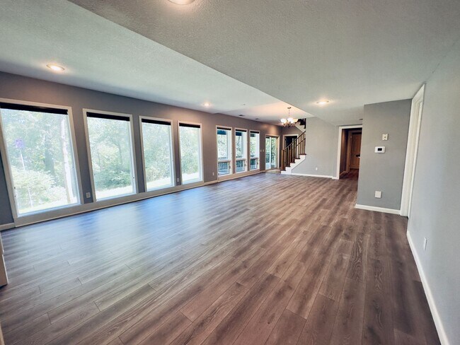 Building Photo - {6411} Enchanted Lake Estates + Updated Kitchen, Fresh Paint Throughout +  Main Floor Primary Bed...