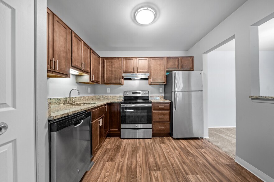 Spacious kitchen with stainless steel appliances at Park Lane Apartments in Southfield - Park Lane Apartments